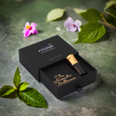 Patchouli-based floral perfume oil with warm amber tone